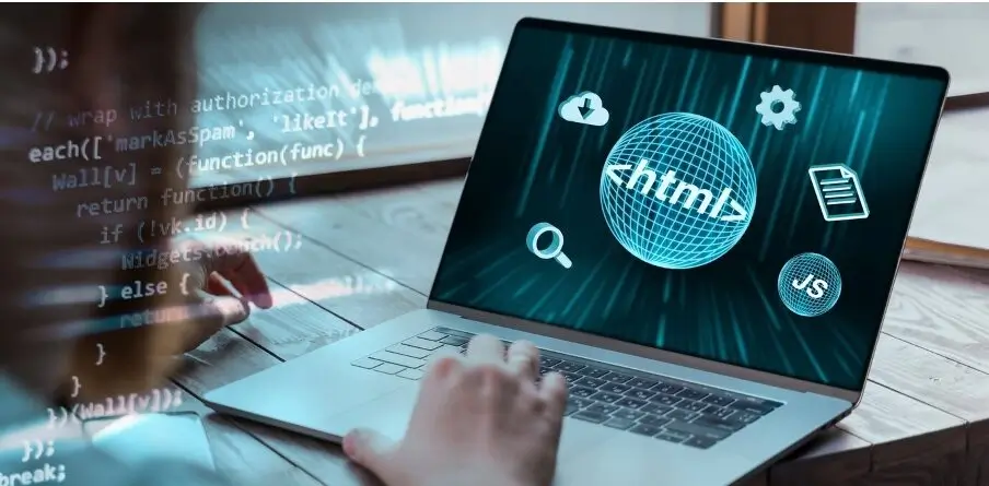 Osoba pracująca na laptopie z wyświetlanymi ikonami technologii web developmentu, takimi jak HTML, JavaScript, chmura obliczeniowa i ustawienia. Ilustracja symbolizuje wprowadzenie do tworzenia stron internetowych i podstawowych technologii programowania.